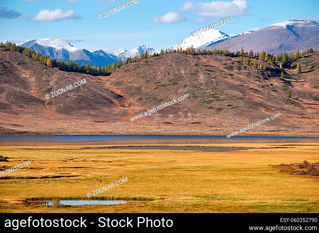 View on Altai lake Dzhangyskol and mountain plateau Eshtykel. North Chui ridge. Altai, Siberia, Russia
