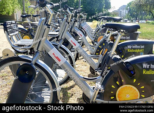 16 June 2021, Berlin: Rental bikes from the provider Nextbike stand on a sidewalk on Karl-Marx-Allee. The cooperation between Nextbike and Edeka has been in...