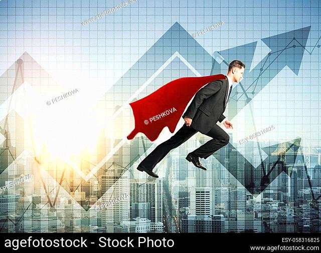 Side view of abstract businessman hero on city background with abstract chart arrows. Leadership concept. Double exposure