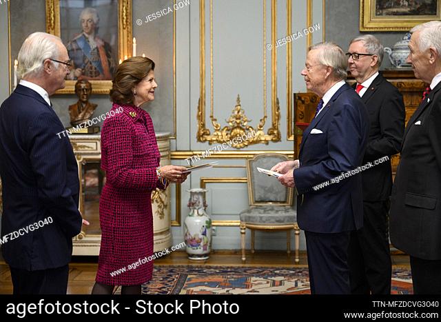 STOCKHOLM 20231220 King Carl Gustaf, Queen Silvia, Christer Persson, Carl-Gustaf Piehl and Peter Möller when the Swedish Masonic Order gives Queen Silvia a gift...