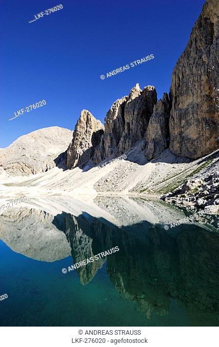 Reflection of Croda del Lago on Lago di Antermoia, Rosengarten group, Dolomites, Trentino-Alto Adige/South Tyrol, Italy