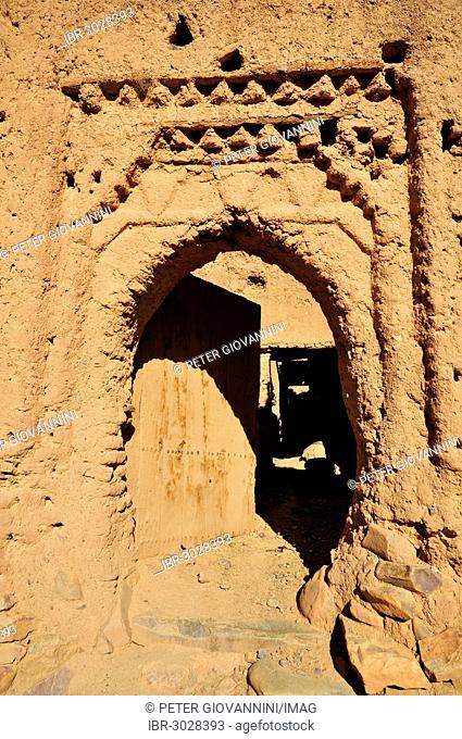 Clay stucco of a decaying entrance gate in the Kasbah Tamnougalt near Agdz