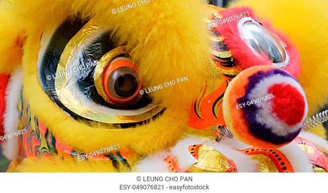 Yellow Chinese lion dance for lunar new year