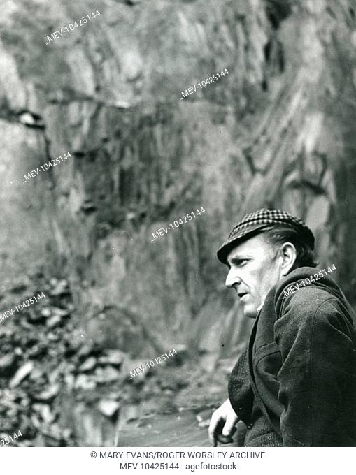 Portrait of a quarryman resting, at Dinorwig (or Dinorwic) Slate Quarry, near Llanberis, North Wales