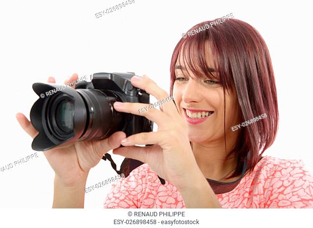 Young woman with photo camera. Isolated over white background