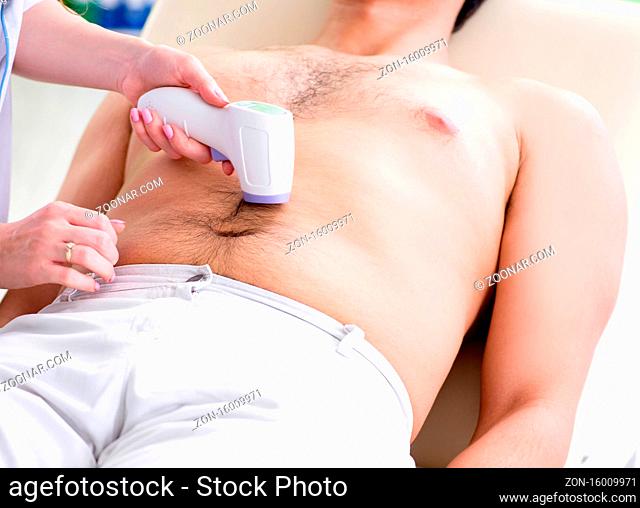 The young man visiting doctor for epilation