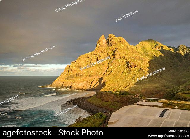 Spain, Canary Islands, Tenerife Island, Punta del Hidalgo, coastal mountains at sunset