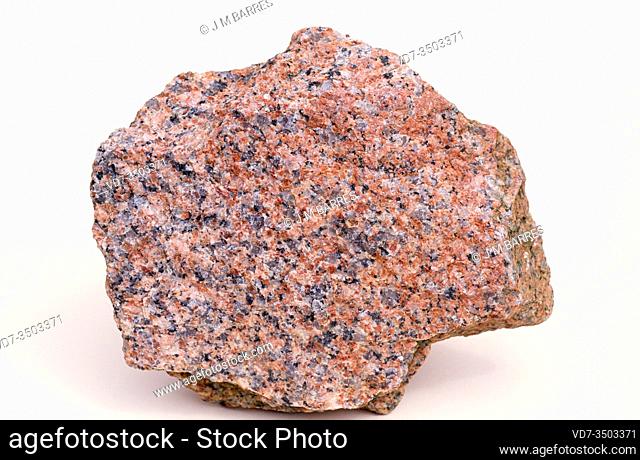 Pink granite. Granite is an igneous intrusive rock with holocrystalline texture. Sample