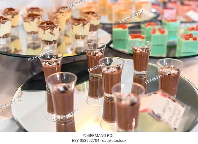 Buffet mousse dessert in little glasses. Catering for wedding, party or events
