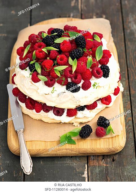 Pavlova with raspberries and blackberries