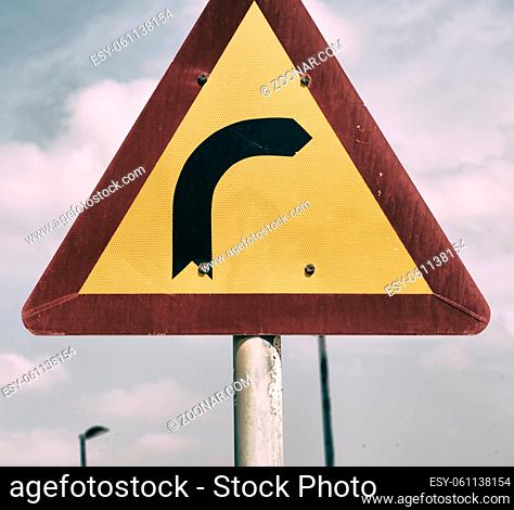road signal attention of the curve in the sky like abstract background