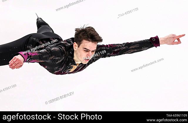 RUSSIA, CHELYABINSK - DECEMBER 21, 2023: Figure skater Makar Ignatov performs a death drop during his men's short programme as part of the 2024 Russian Figure...