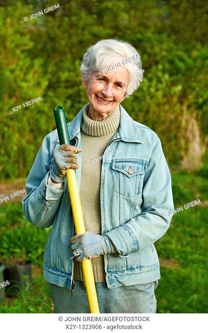 Portrait of a senior woman working in the garden