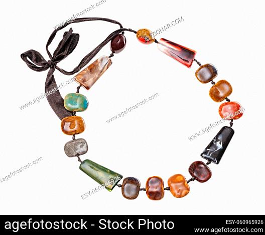 top view of necklace from various hand made ceramic beads isolated on white background