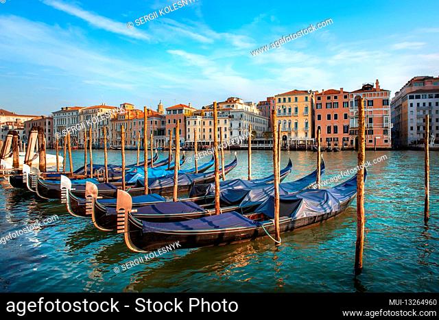 Gondolas and architecture in Venice at sunset, Italy