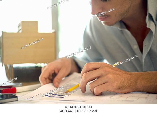 Businessman working on paperwork