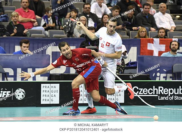 L-R Daniel Sebek (CZE) and Manuel Maurer (SUI) in action during the Men's World Floorball Championship, group B match Czech Republic vs Switzerland