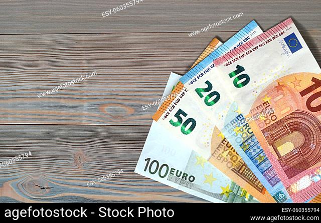 money euro on a wooden desk bank note