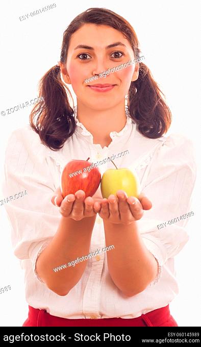 woman holding in hand two fresh natural healthy apples