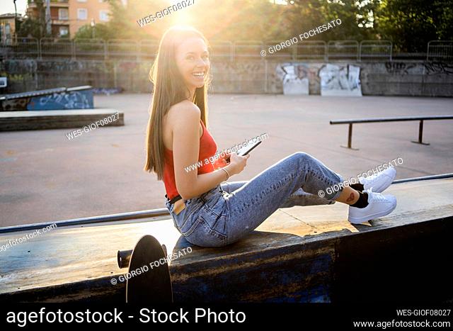 Young woman at a skatepark