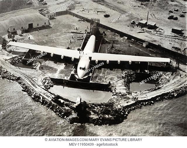 The Huge Engineless Hughes H-4 Hercules / Spruce Goose Under-Construction at Terminal-Island, San Pedro, Long Beach Harbour, California, Usa