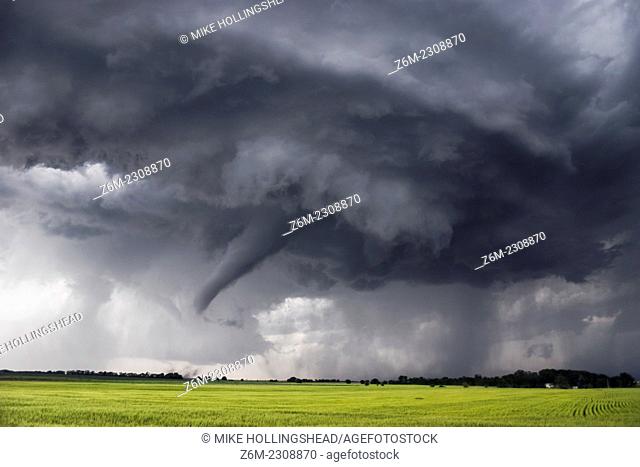 Tornado forms under long-lived supercell in northern Kansas, May 24, 2004. This supercell produced upwards of 15 tornadoes in just a few hours