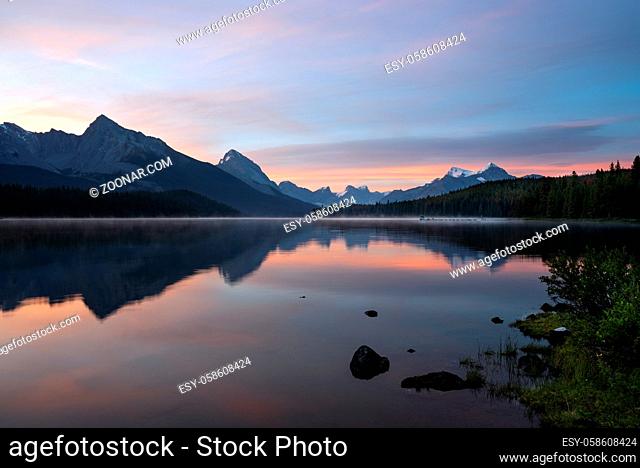 Long exposure panoramic image of the Maligne Lake close to Jasper with early morning mood, Alberta, Canada