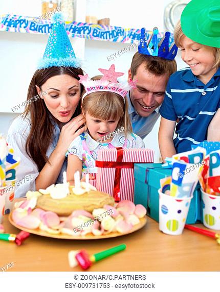 Cheerful little girl celebrating her birthday
