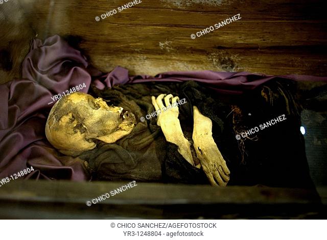 A mummy sits on display in a museum that was formerly the San Juan Bautista convent in Tlayacapan, Mexico