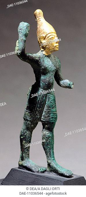 Statuette depicting a standing god, bronze and gold artefact from Ugarit (now Ras Shamra), Syria. Assyrian civilisation, 1400-1200 BC