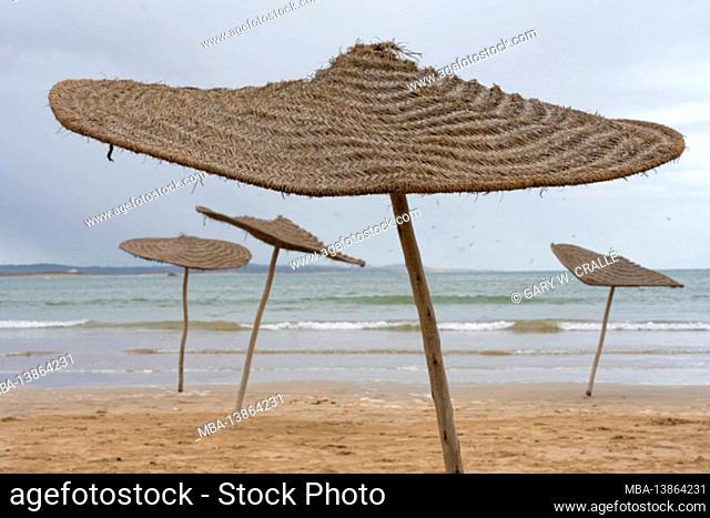 Atlantic Ocean fishing port, Essaouira, UNESCO World Heritage Site, beach umbrellas, Morocco, North Africa