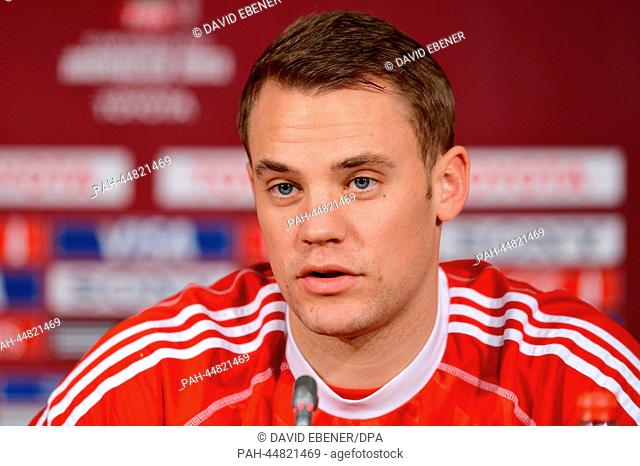 Bayern Munich's goalkeeper Manuel Neuer speaks during a press conference at the 'Stade Adrar' stadium following a practice session of Bayern Munich in Agadir