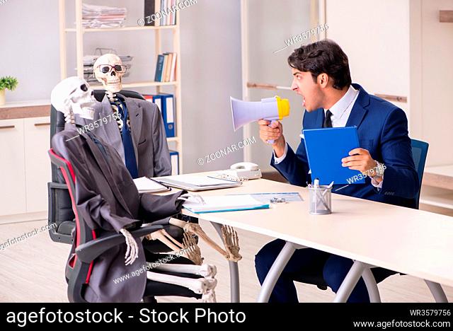 Funny business meeting with boss and skeletons