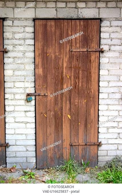 Wooden door with lock. Rawa Mazowiecka Central Poland