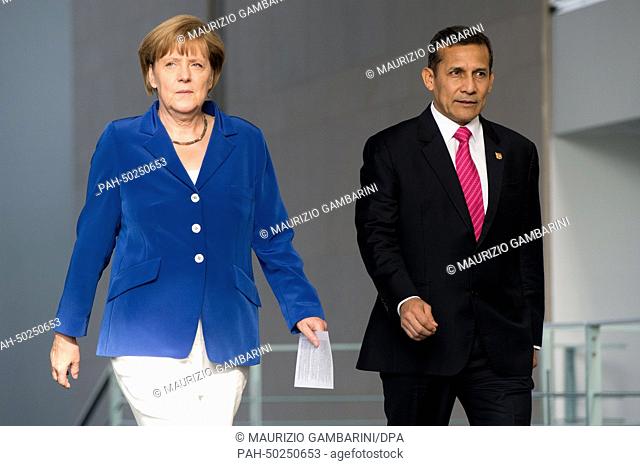 German Chancellor Angela Merkel (CDU, L) and Peruvian President Ollanta Humala Tasso arrive for a press conference at the German chancellery in Berlin, Germany