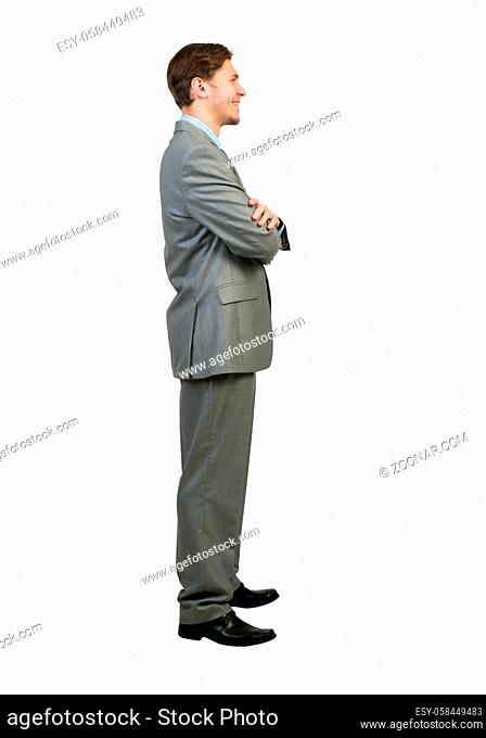 Full body of young confident businessman isolated on white background