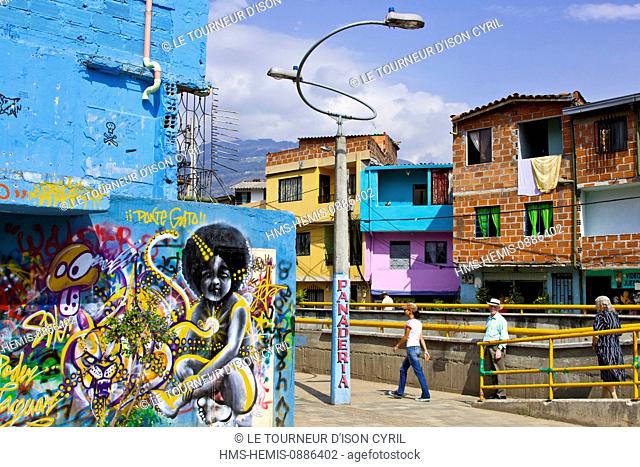 Colombia, Antioquia Department, Medellin, a wall painting facing houses in the North east poor area