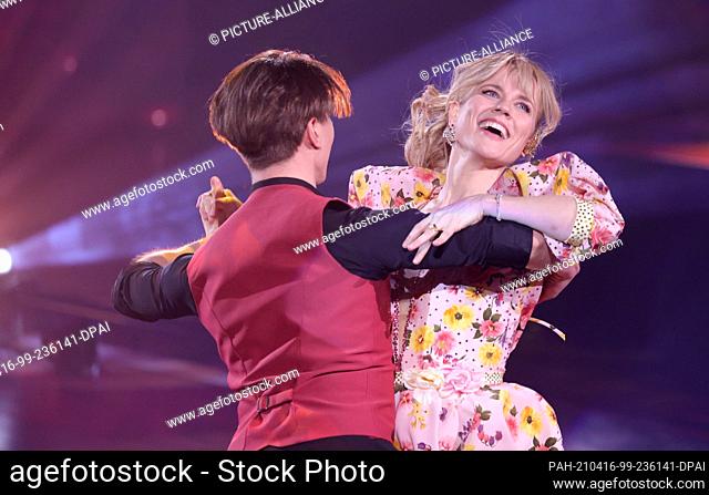 16 April 2021, North Rhine-Westphalia, Cologne: Ilse DeLange and Evgeny Vinokurov dance a Quickstep to ""Suddenly I See"" in the sixth round of the RTL dance...