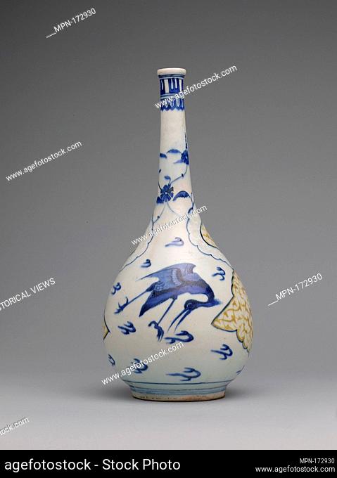 Bottle with Flying Cranes. Object Name: Bottle; Date: 1650s; Geography: Made in Iran, Kirman; Medium: Stonepaste; polychrome painted under transparent glaze;...