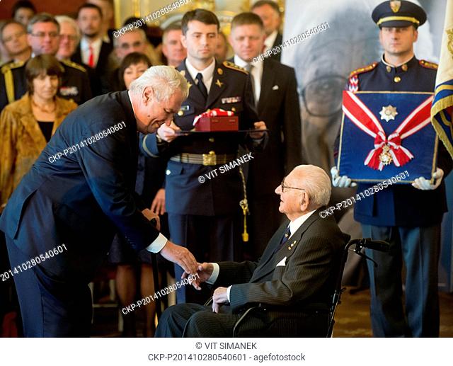 Czech President Milos Zeman (left) bestowed the Order of the White Lion, the highest state decoration, on Sir Nicholas Winton (right)