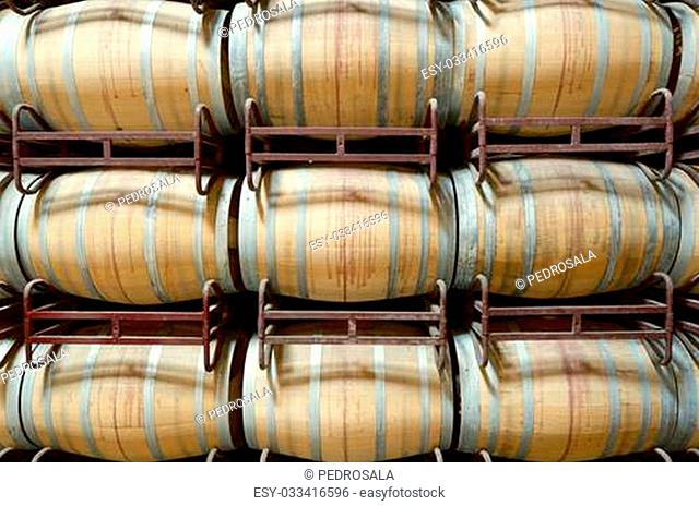 stacked wine barrels to ferment the wine, La Rioja, Spain