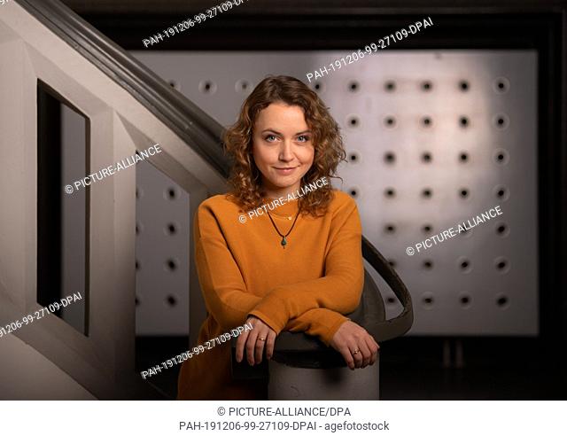 29 November 2019, Saxony, Dresden: Actress Stefanie Bock, sits in the staircase of the Boulevardtheater Dresden. (to dpa ""Actress Stefanie Bock: I like being...