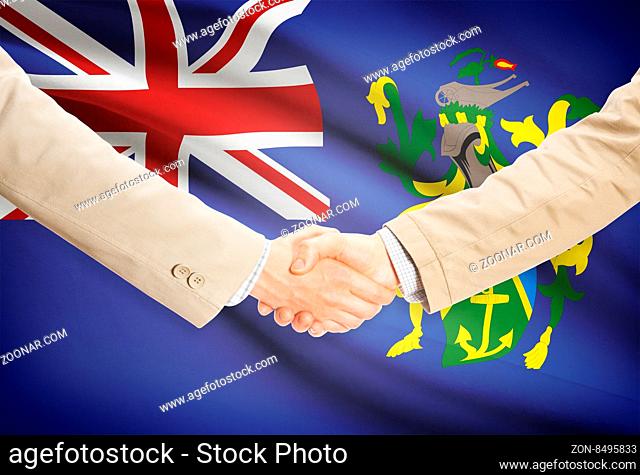 Businessmen shaking hands with flag on background - Pitcairn Island