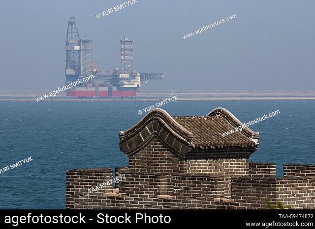 CHINA, HEBEI PROVINCE - MAY 24, 2023: A view shows the TS Opal offshore drilling rig at Shanhaiguan Shipyard as seen from Laolongtou (Old Dragon’s Head)