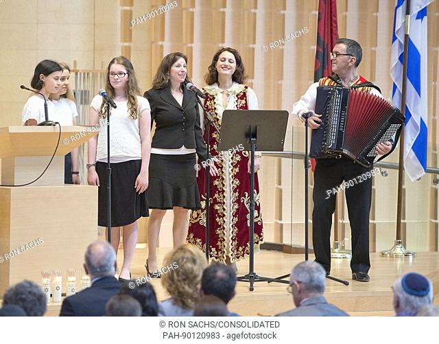 Several hundred people gather Sunday, April 23, 2017 at Washington, DC-s Adas Israel Congregation to commemorate Yom Hashoah, Holocaust Remembrance Day