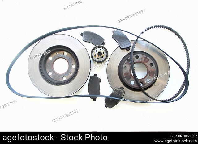 Pair old car brake disc, pads, oil filter and belt isolated on white background, São Paulo, Brazil