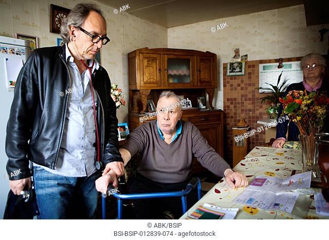 Photo essay on a country doctor in Picardie, France. He shares his time with consultations at his two offices and home visits
