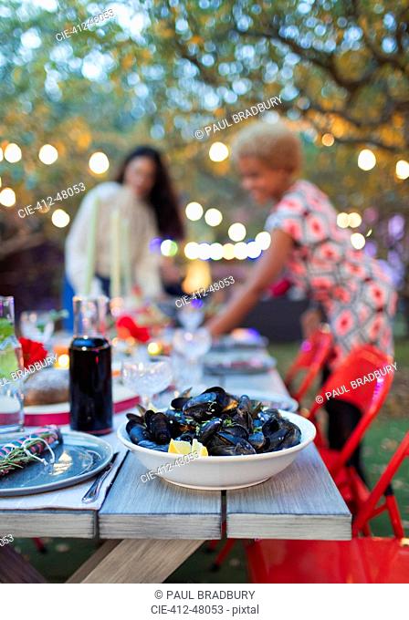 Mussels on dinner garden party table