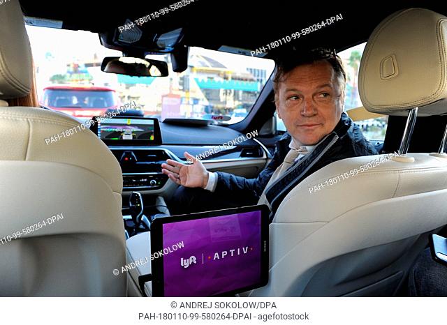 The manager of the automotive supplier Aptiv, Serge Lambremont, explains the automatically driven car of the company in Las Vegas, US, 07 January 2018