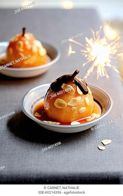 Poached pears with almonds and caramel